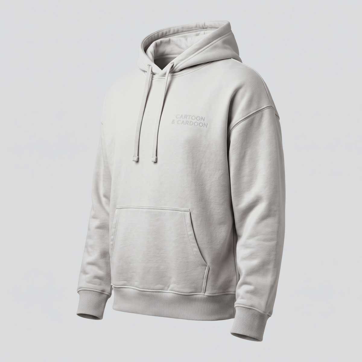Boxy Hoodie, Cement, three-quarter view — CARTOON & CARDOON