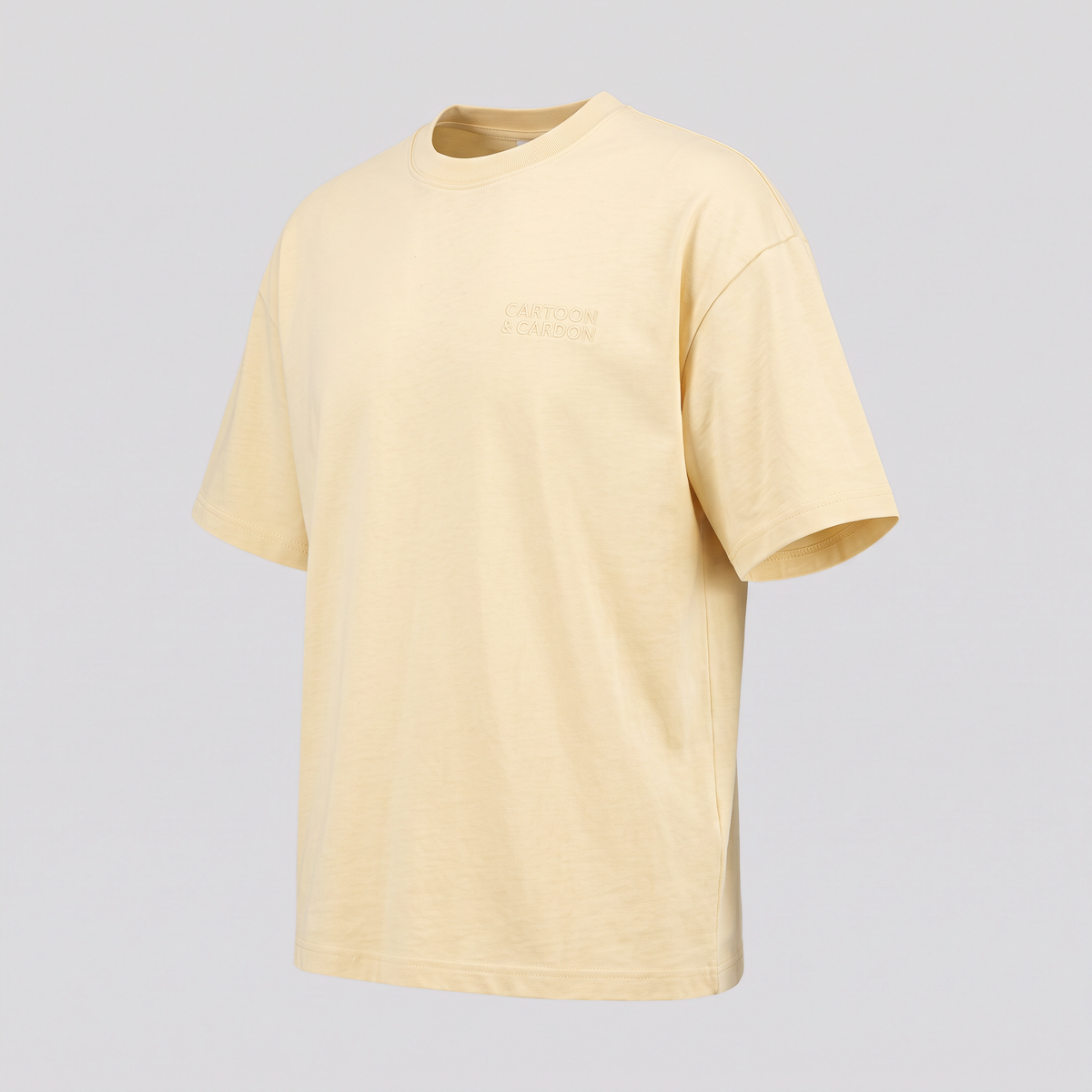 Heavyweight T-Shirt, Buttercream, three-quarter view — CARTOON & CARDOON